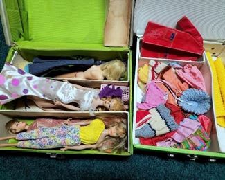 Vintage Barbies with cases and accessories