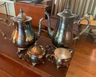 #22	Rogers silver plat tea and coffee pot with sugar creamer 	 $30.00 			

