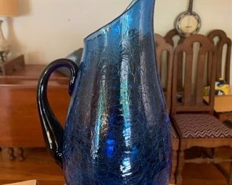 #24	Blue blown glass crackle vase 14.5 tall 	 $20.00 			
