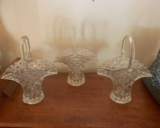 #27	3 glass baskets 13 inches tall 	 $30.00 			
