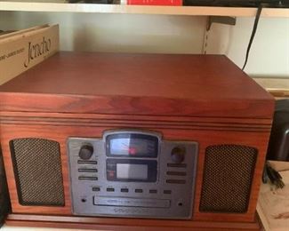 #34	Crosley turn table cd player and cassette player 	 $30.00 			
