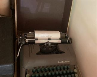 #37	Smith Corona vintage type writer in case 	 $20.00 			
