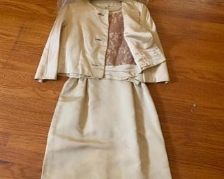 #47	vintage satin small dress with short sleeves and a 3/4 length sleeve jacket 	 $20.00 			

