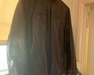 #49	Tommy Hilfinger brown leather men jacket size medium w 4 zipper pockets 	 $35.00 			
