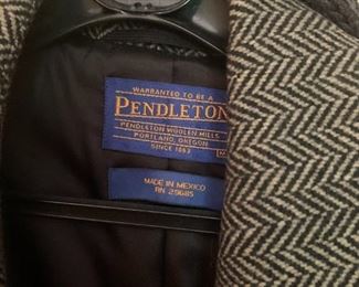 #55	Pendleton wool black haring bone men coat medium size 	 $30.00 			
