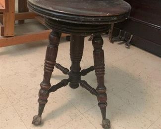 #62	piano stool with swivel top and ball/claw feet 	 $25.00 			
