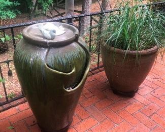 planter with skinny pterodactyl arms