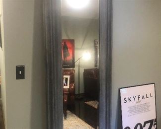 a mirror not reflecting the image of a vampire standing in front of it