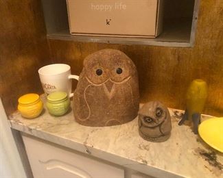 one drowsy owl, one wide-awake owl