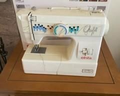 Elnita Sewing Machine & Singer Sewing Machine and cabinet
