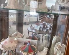 Various porcelain carousels and angel figurines
