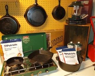 Look at that vintage campstove and cast iron. These are in great shape!