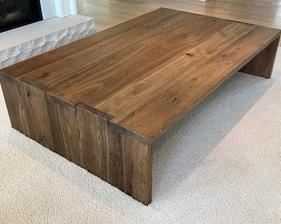 OAK BRÛLÉ WATERFALL COFFEE TABLE.Truly an amazing table with natural wood grains and design bringing a little bit of nature into your home. From the Restoration Hardware website; Echoing the American Studio Crafts movement of the 1970s, our collection from designer Luay Al-Rawi imbues pure form with the textural richness of European oak. Minimalist silhouettes and traditional joinery give full expression to the wood, replete with the inherent knots, cracks and grain patterning that make each piece one of a kind.
Measures 67" x 43" x 16"