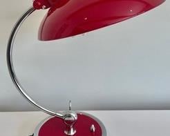 Fritz Hansen Kaiser Idell Luxus Table Lamp, designed by Christian Dell. A simple yet, iconic desk lamp. Measuring 18 inches tall and is in great condition!
It is versatile and- thanks to the multiple finishes available- can be used as a desk lamp to work or study, as a bedside table lamp, or just to create a diffused light atmosphere in the living room.