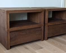 Pair of Restoration Hardware Oak Brûlée Nightstands. There are a few light scratches, but both are in excellent condition! Each measures 26” wide, 20” deep and 22” high.