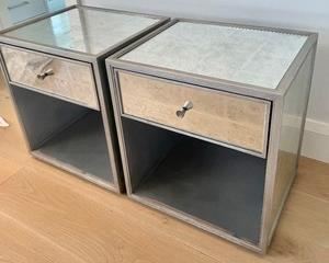 Pair of Restoration Hardware Delaney Mirrored Side Tables measuring 18x15x20 inches. There is some wear to the edge and a slight bit of rust.