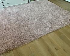 Pottery Barn Kids Pink Shag Performance Area Rug in a soft muted pink hue and measuring 96x121 inches