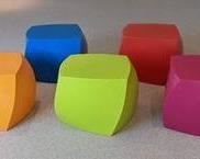 Heller Frank Gehry Twist Cubes. Includes five vibrantly colored cube seats! Add a fun splash of color to your home with these great twist cubes!
All have some light scratches or paint splotches from being used at a children's craft table. Please see photos for a detailed look. Each measures 16.5” x 19” and 16.5” high.