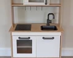 IKEA Kids Play Kitchen. Fun addition to any children's playroom! Measures 28.5” wide, 15” deep and a little over 42” high