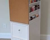 White Craft Storage Tower. There are some paint spots/scratches, but in overall great shape! Includes the pictured paint. Measures 17” x 20” and 56” high.