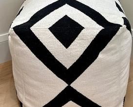 Upholstered Abstract Design Ottoman measuring 19" x 19" x 19"