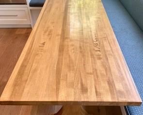 Delightful Wooden Dining Table measuring 86x30x29 inches. There is some wear to the top including paint as it was used for children's crafting projects