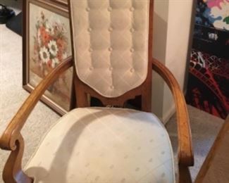 Upholstered captain chair to dining set