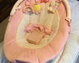 Baby bouncy chair with toys