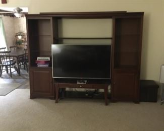 Large entertainment center (moveable shelf at top) - coffee table under TV - TV also for sale