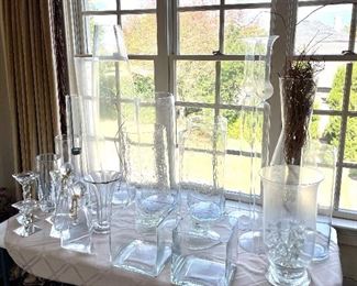 LOTS of clear vases! This is just a sampling. Perfect for parties or weddings! Lots of white candles too!