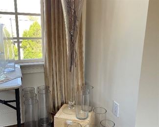 LOTS of clear vases! This is just a sampling. Perfect for parties or weddings! Lots of white candles too!
