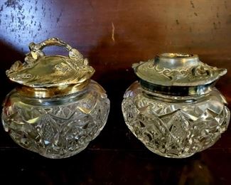 Set of silver plate topped dresser jars $45