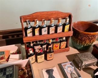 UNIQUE MINI FAKE WHISKEY BOTTLES. CUTE BUT READ THE LABLES ON THE BOTTLE, THEY ARE FULL OF SUGAR WATER