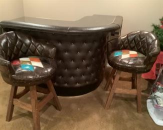 1970’s bar with barrel chairs.  53” from end to curve in both directions.  Chairs sit 26” high