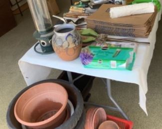Lots of pots and garden items 