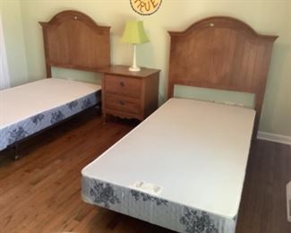 Twin bed headboards, box springs and metal frames.  Excellent condition.  Each bed $100