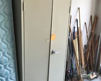 #62 Metal Cabinet w/3 shelves 30x15x66 (door handle doesn't lock) $45.00
