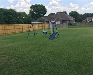 #107	Swing Set in Yard for kids - slide as is (you move)	 $20.00 
