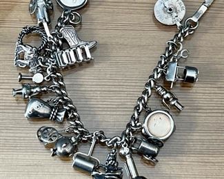 Item 61:  Sterling Silver Charm Bracelet:  $65