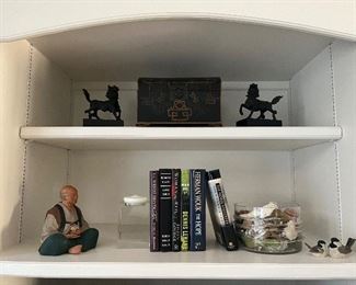 Assorted figurines and books