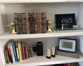Books, bookends, clock, figurines 