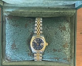 Ladies 18kt/Stainless Rolex- Blue Face Oyster with papers original box 
