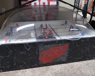 Electronic bubble hockey machine