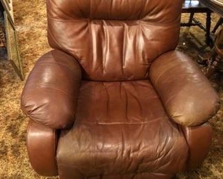 Comfy leather swivel rocker recliner by Best Chairs.