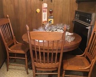 Wonderful antique oak clawfoot table and chairs