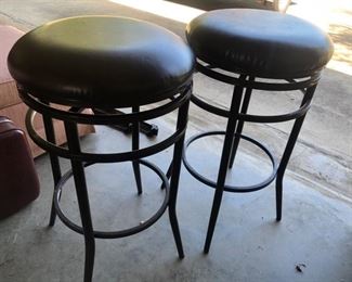 pair of iron bar stools