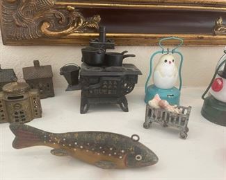 Antique fish decoy, vintage cast iron stove toy. 