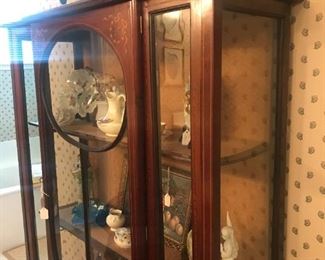 China cabinet and figurines