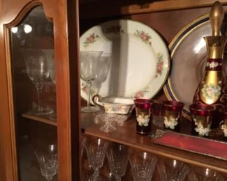 Dishes in China cabinet