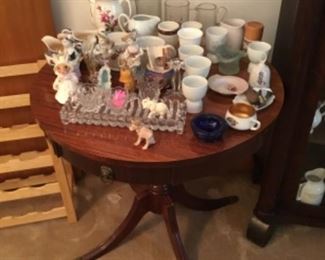 Collectibles in living room on another vintage table